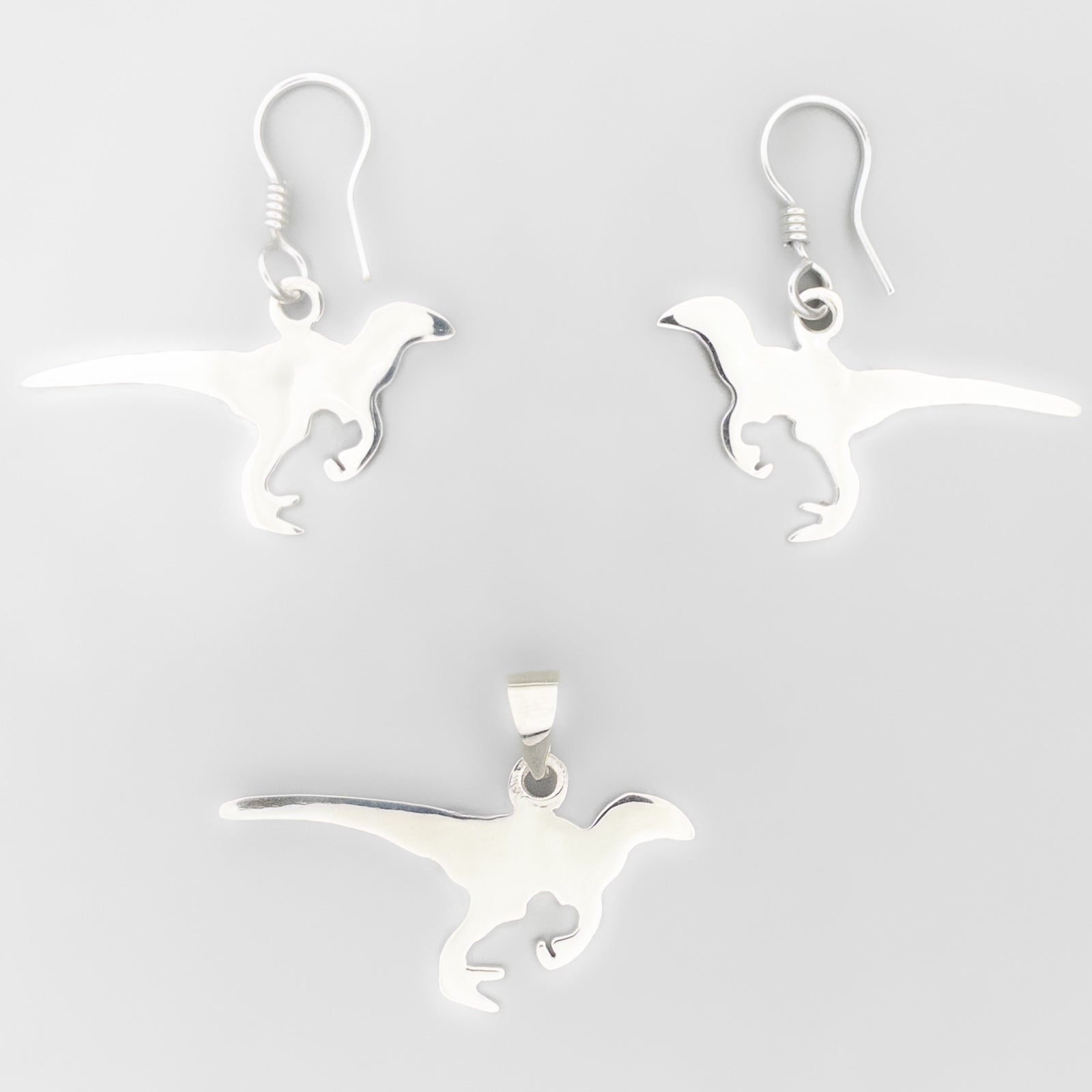 Silver Velociraptor Silhouette Set